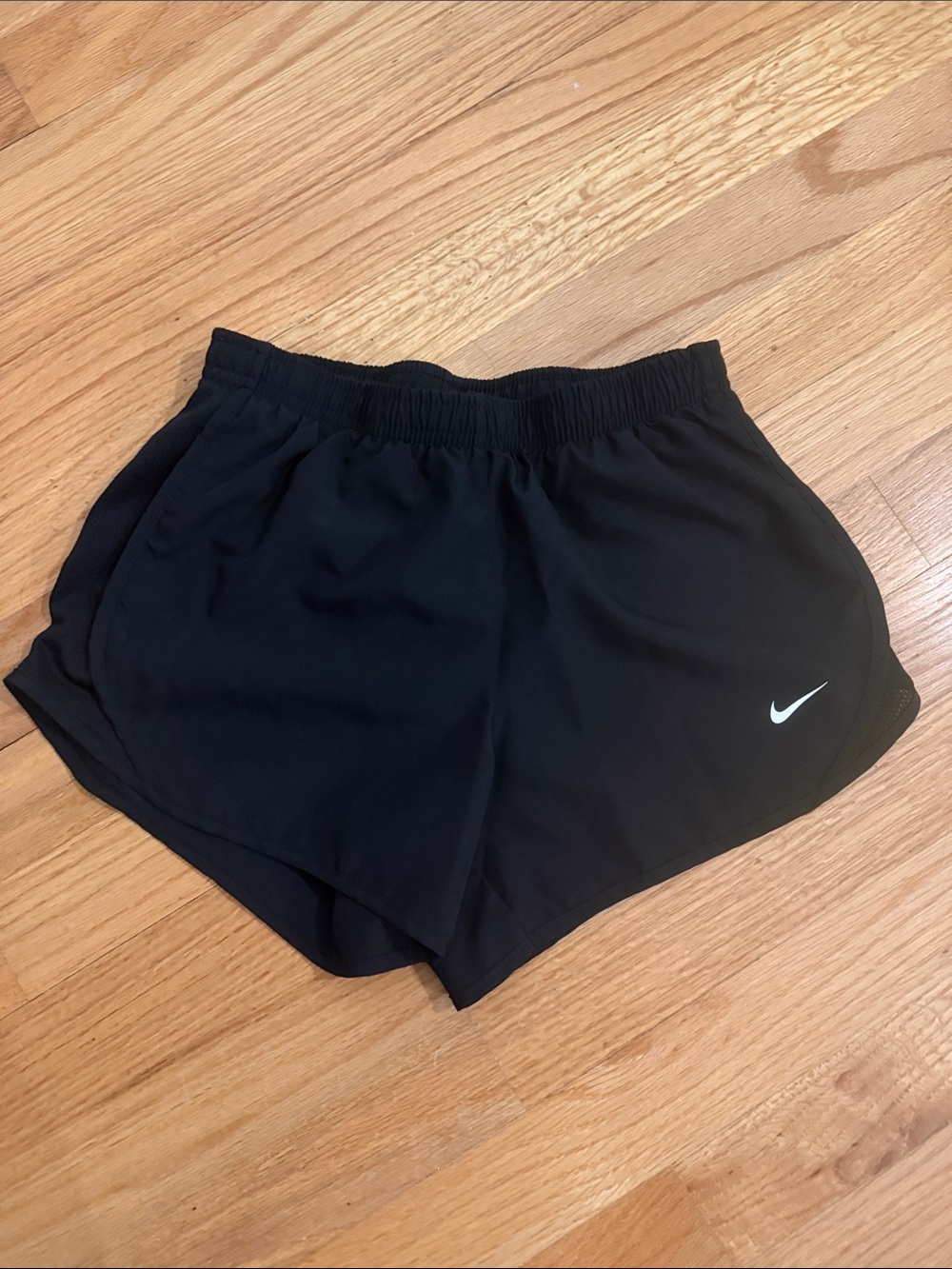 Nike Girl’s Black Athletic Shorts with White Swoosh (Size M)